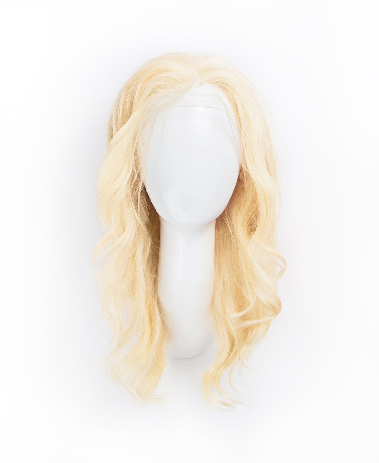 blonde human hair wig on a stand