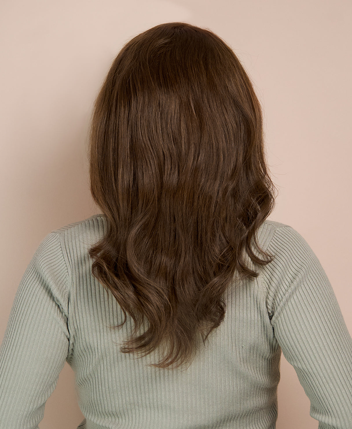 woman wearing human hair wig